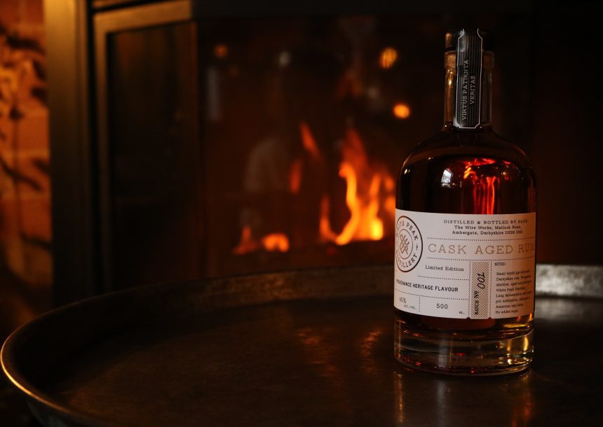 Cask Aged Rum in front of a fire